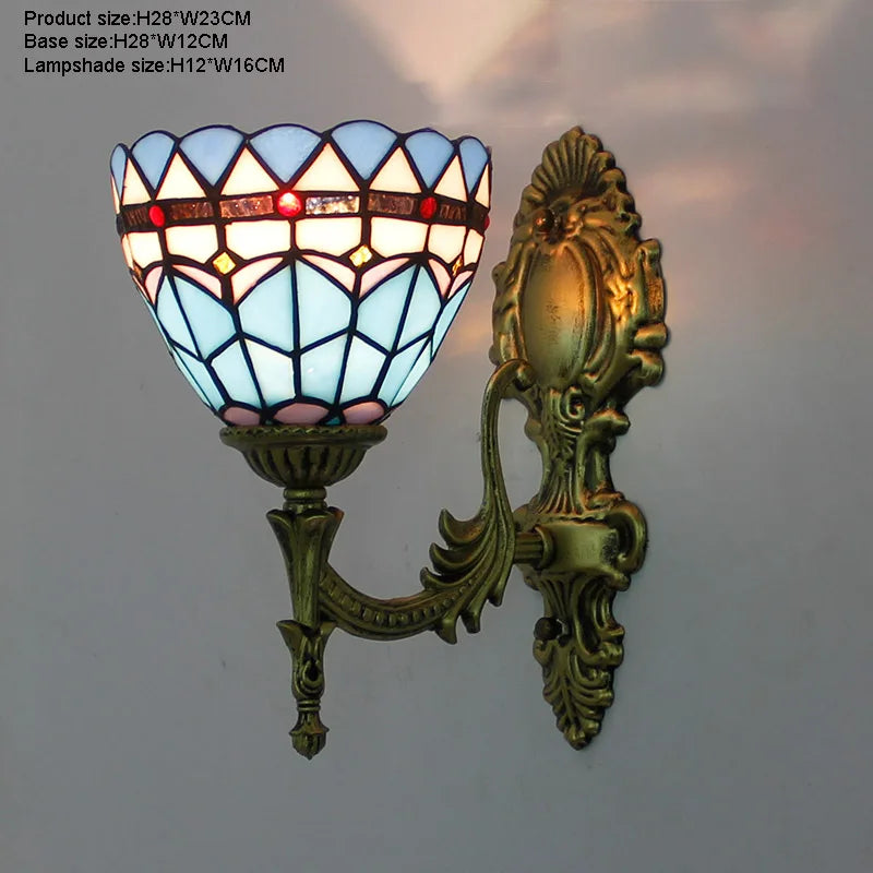 Applique da parete in stile Tiffany con vetro colorato blu e bianco.