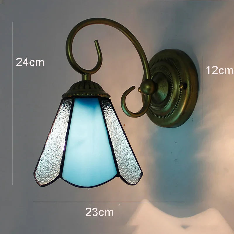 Applique da parete Tiffany in vetro blu e bronzo.