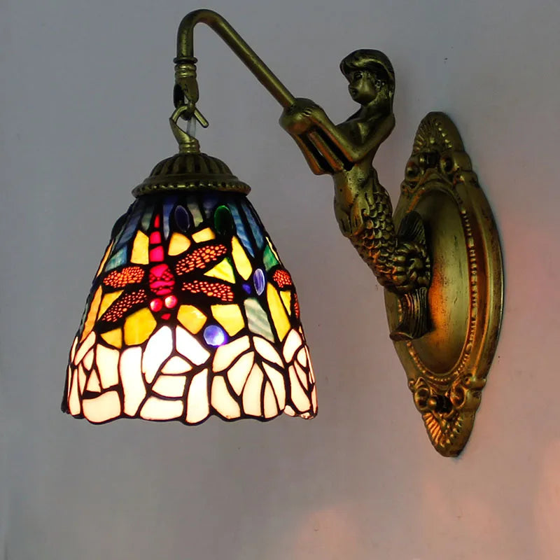 Applique da parete a forma di sirena in stile Tiffany con finitura bronzo.