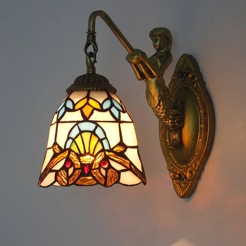 Applique da parete a forma di sirena in stile Tiffany con finitura bronzo.
